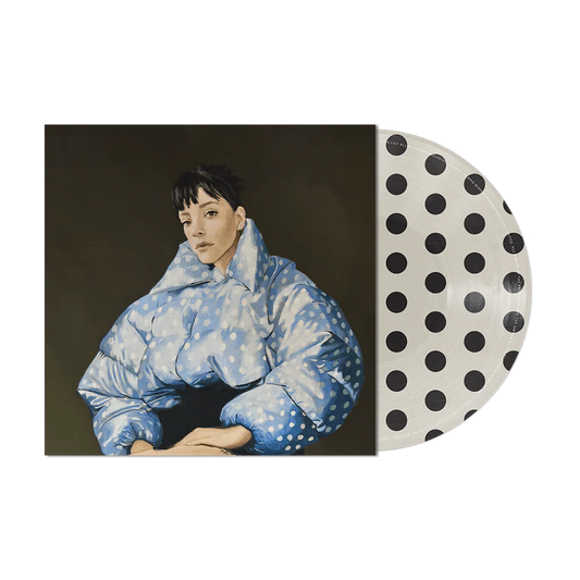 Vinyl record with a polka dot design on the cover featuring an illustration of a person wearing a blue patterned outfit.