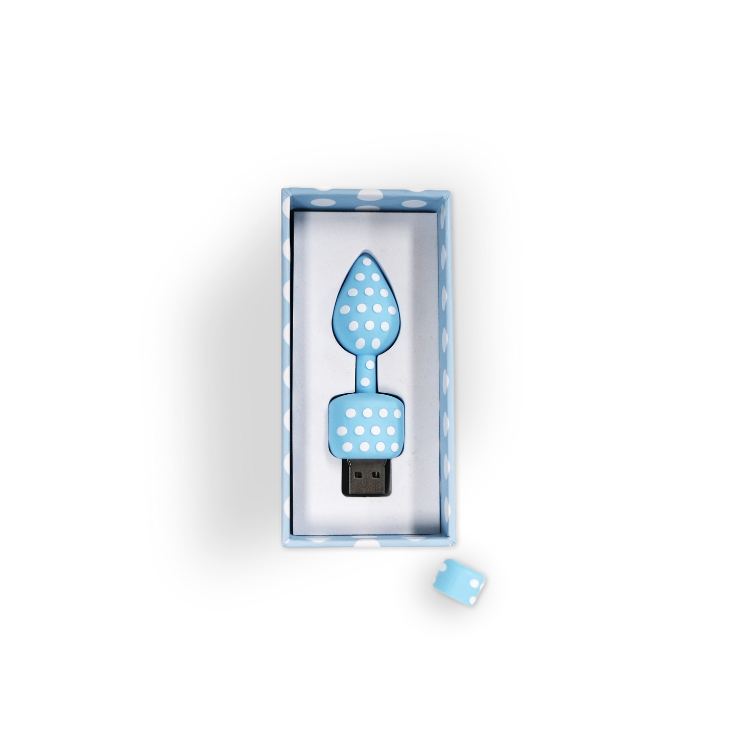 USB drive shaped like a light bulb with polka dots in a box on a white background